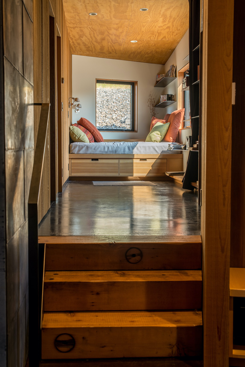 new caelifera cabin's angular geometry echoes origami folds and sawtooth mountain peaks