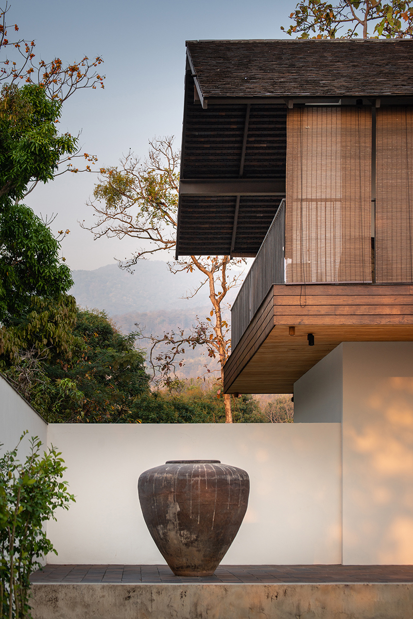 bamboo louvers and gable roof shield nong ho 17 house in thailand from tropical climate