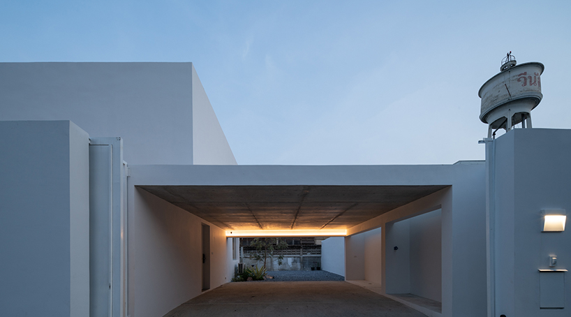 white dense geometric block enfolds private residence in bangkok