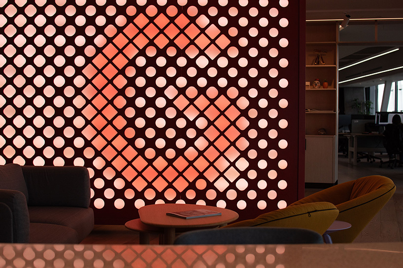 manufactura repurposes beeswax for sustainable translucent lattice panels at mexico city office