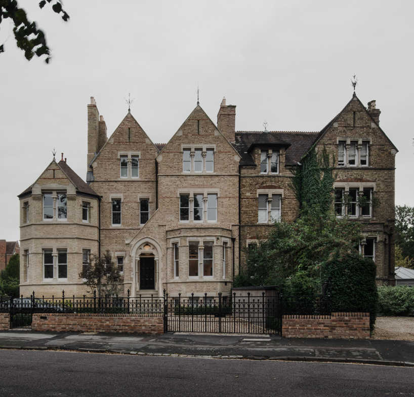 lightweight glass box adheres to 1870s gothic building after hyde + hyde's restoration