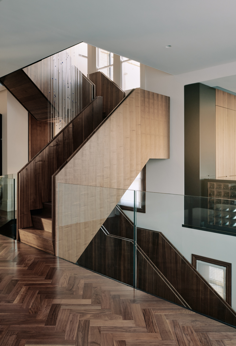 lightweight glass box adheres to 1870s gothic building after hyde + hyde's restoration