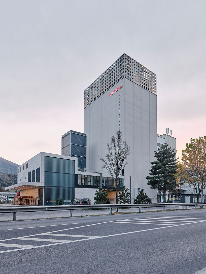 concrete crown by obsermoser + partner architekten transforms a 1978 grain silo into a storing-center for wood pellets