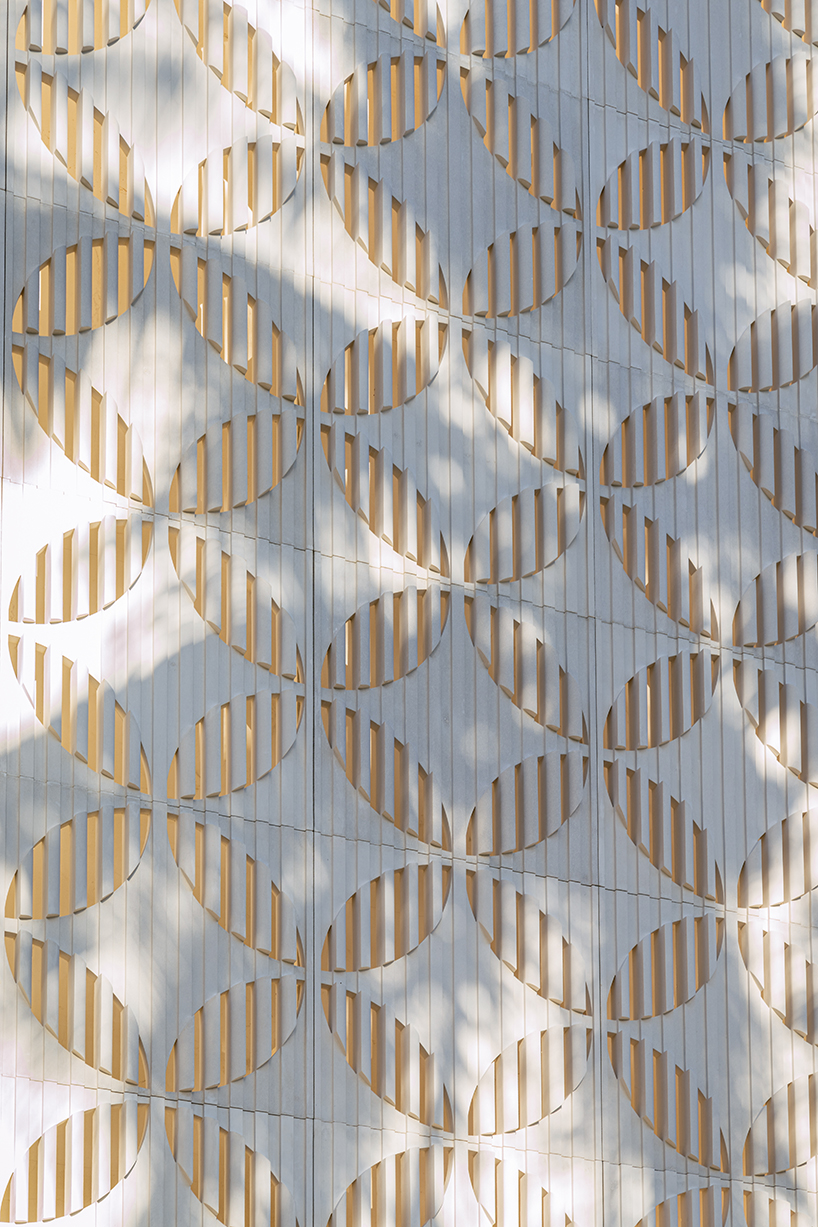 louis vuitton's cancun boutique unveils concrete facade with sculpted flower motif