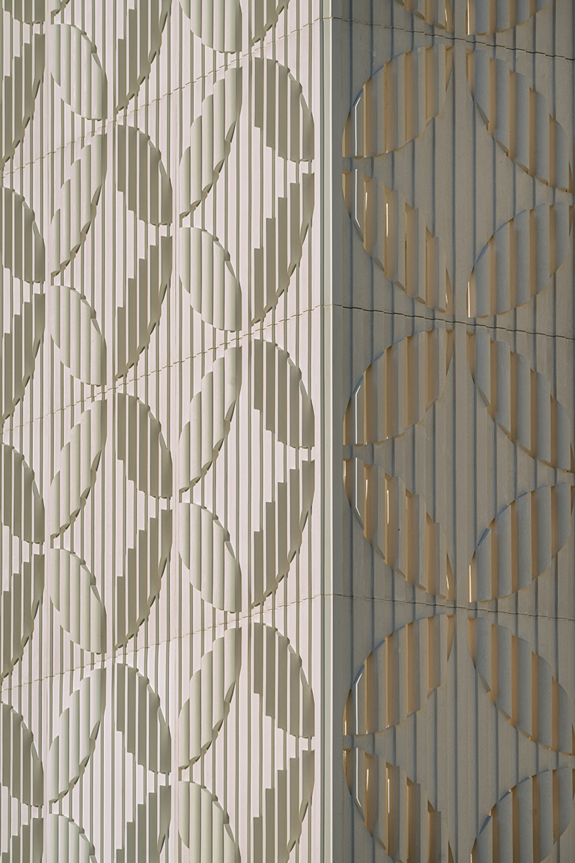 louis vuitton's cancun boutique unveils concrete facade with sculpted flower motif