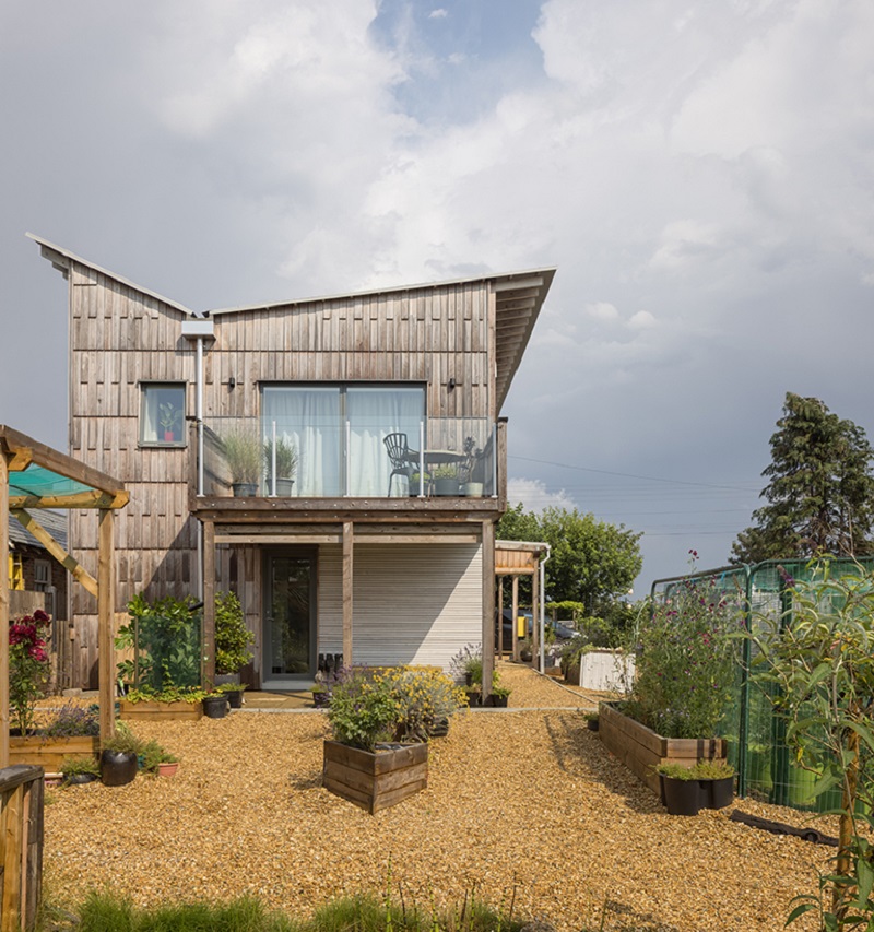 The inverted pitched roof unfolds on Mole Architects' passive house in the UK
