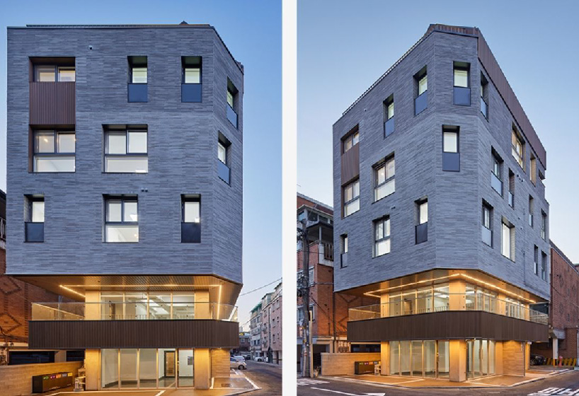 brick tiled residential building stands out in an alley of seoul