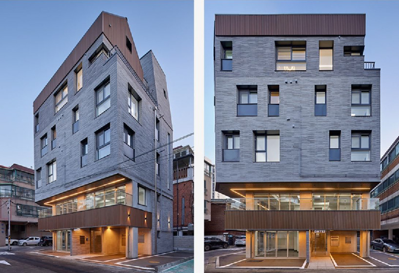 brick tiled residential building stands out in an alley of seoul