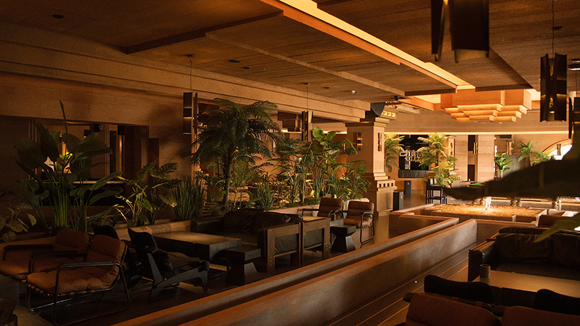 tibetan-style columns and antique furniture enliven wooton designers' chimp club café and bar