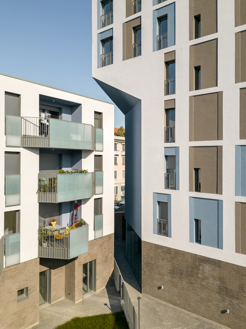 brick-clad residential complex by cino zucchi architetti expands along via valtorta in milan