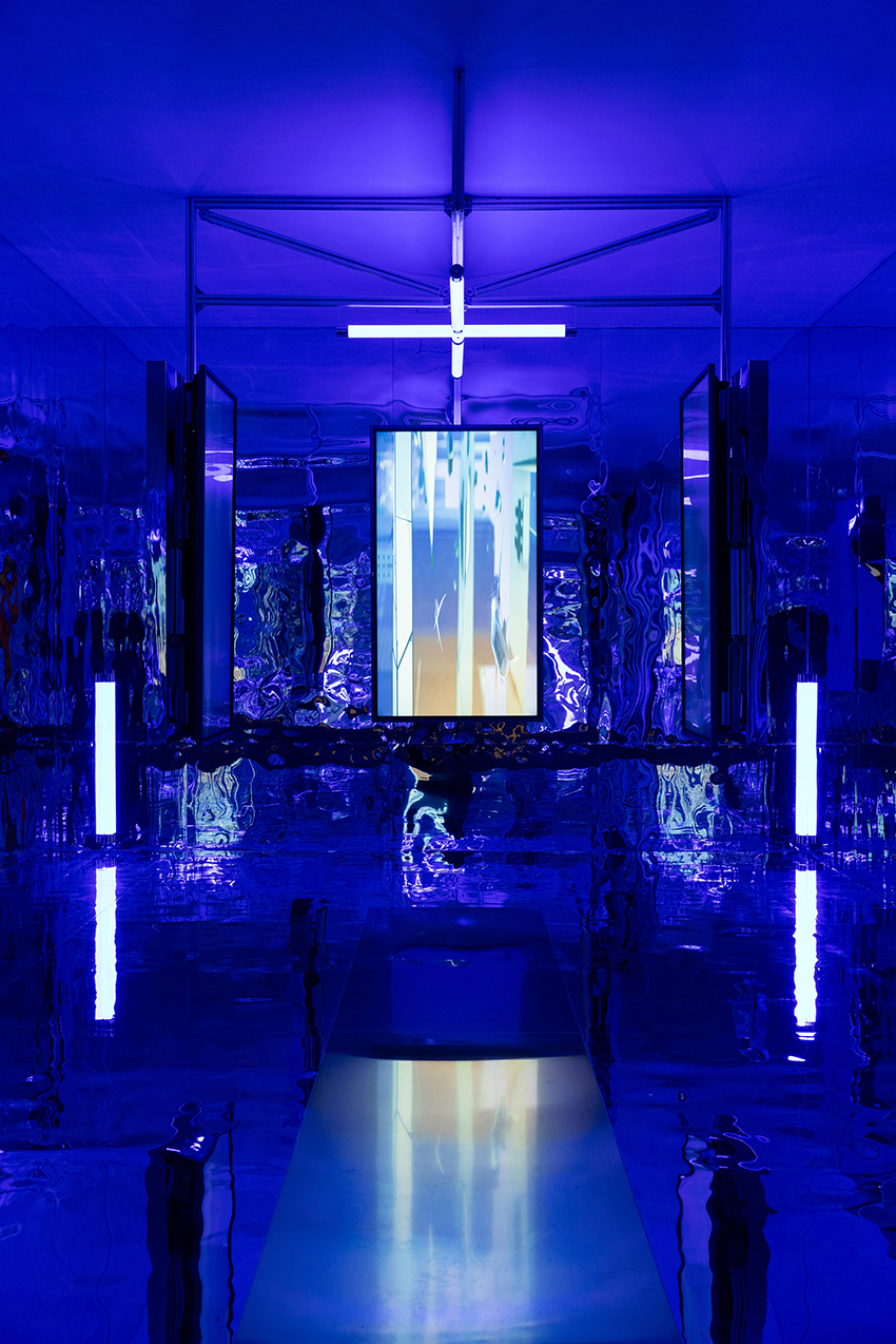 three suspended digital screens translate AI imagery into luminous spatial installation - 2