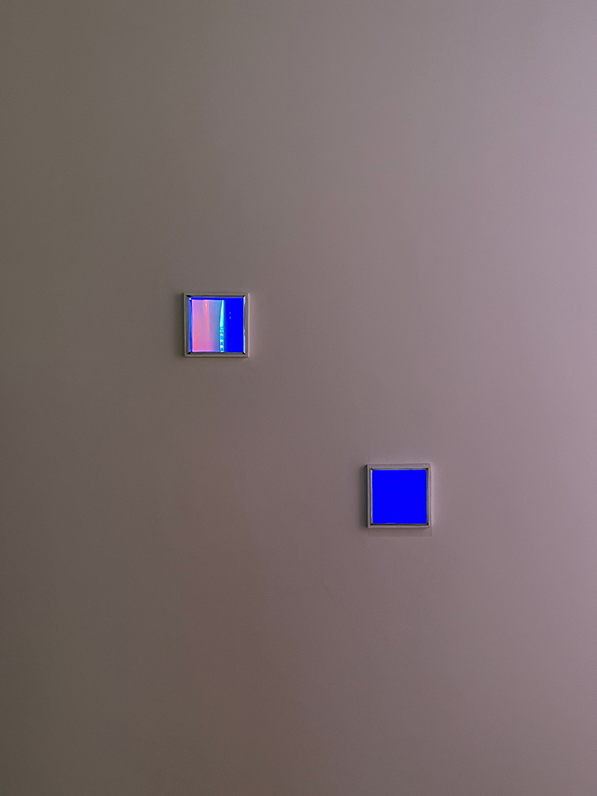 three suspended digital screens translate AI imagery into luminous spatial installation - 10