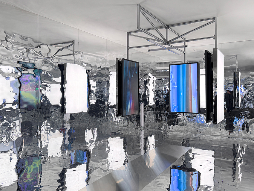 three suspended digital screens translate AI imagery into luminous spatial installation - 1
