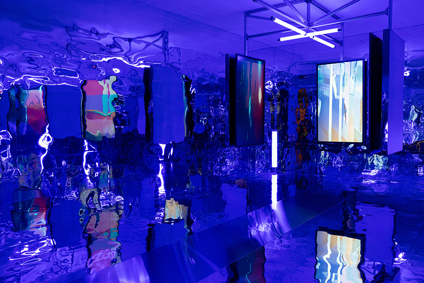 three suspended digital screens translate AI imagery into luminous spatial installation - 3