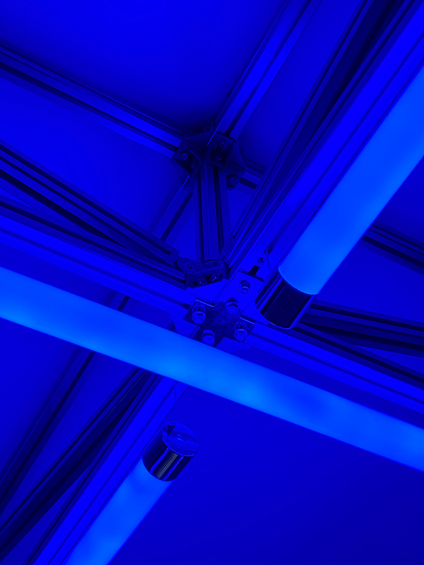 three suspended digital screens translate AI imagery into luminous spatial installation - 8