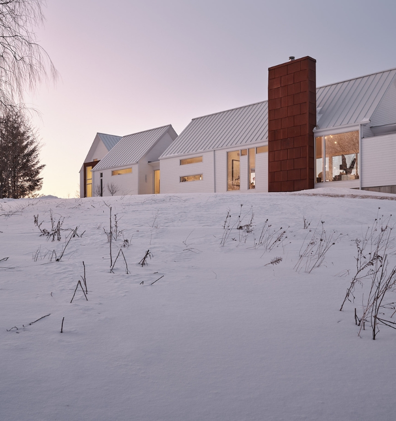 copper steel slabs of rural residence nod to the red earth of caledon badlands in canada
