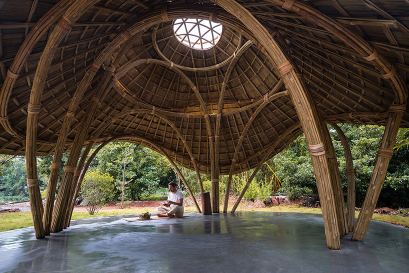 locally harvested bamboo and cane shape this sculptural meditation gazebo in tamil nadu, india