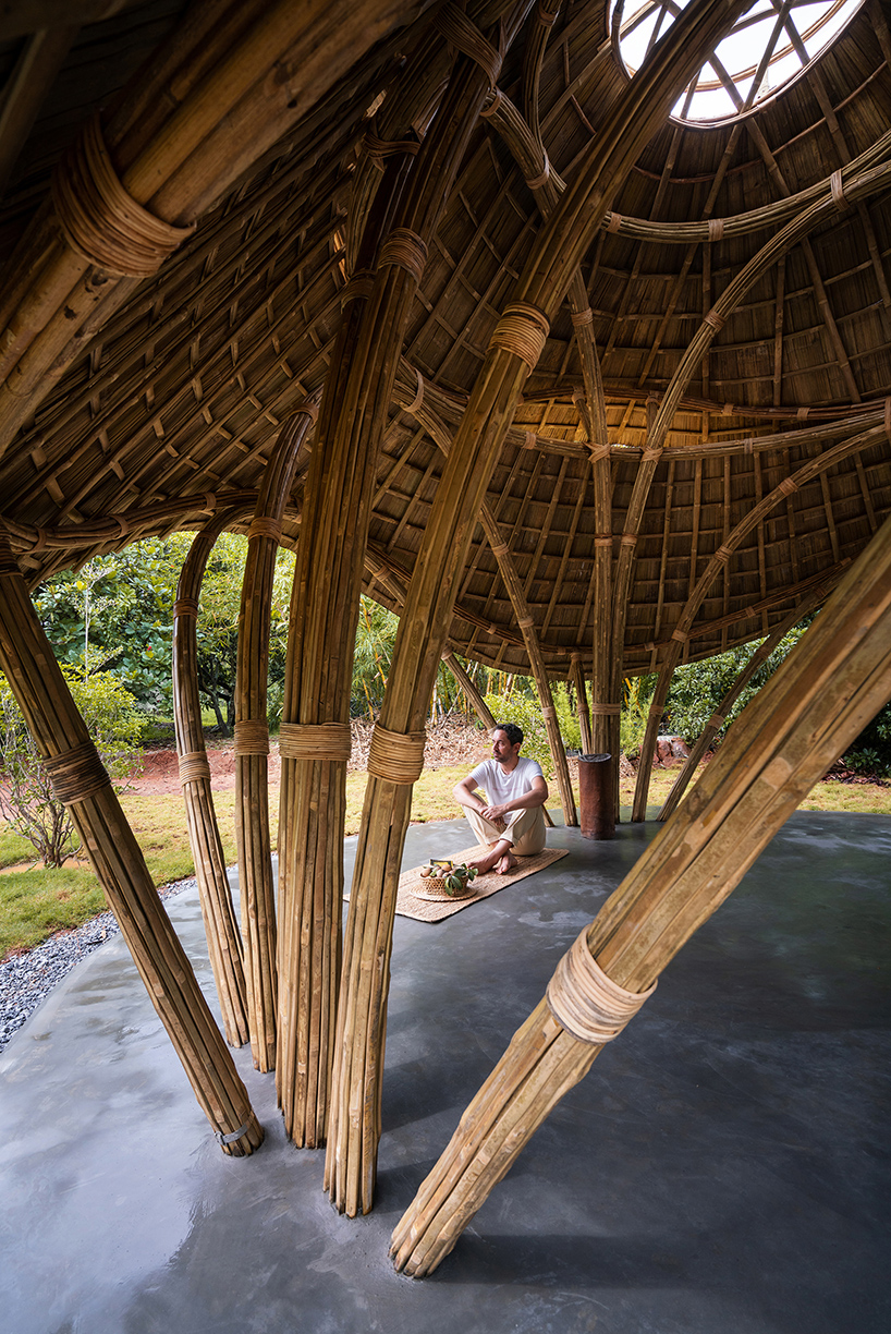 locally harvested bamboo and cane shape this sculptural meditation gazebo in tamil nadu, india