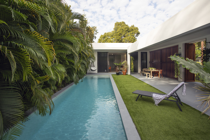 The minimalist oblong Pompei House sprawls across a narrow lot in Miami's historic enclave