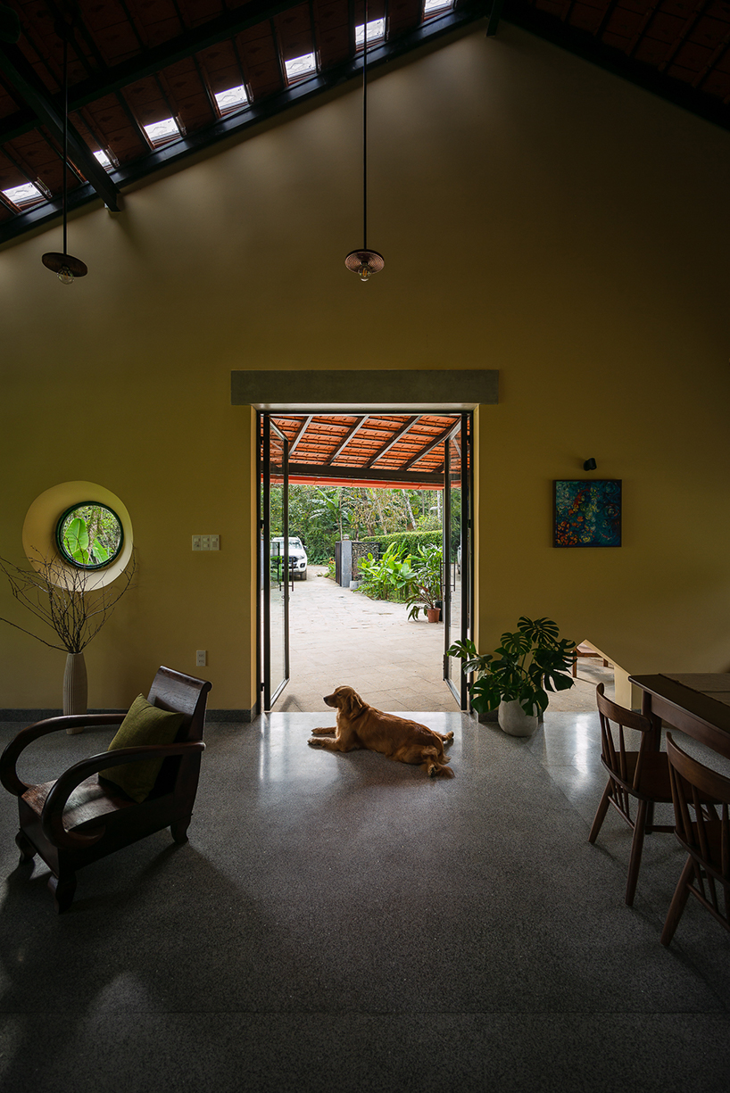 overlapping shingle roofs shield multileveled tien cam house in vietnam