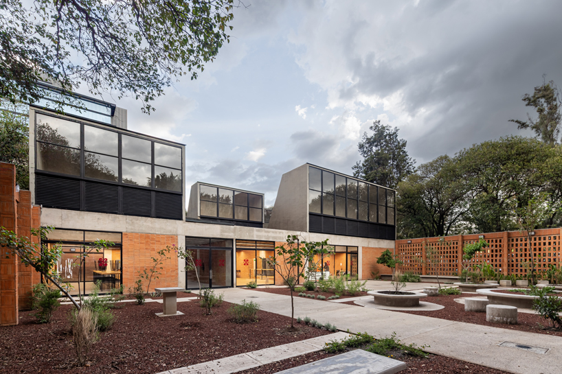 exposed brick and concrete frame social and educational infrastructure in mexico