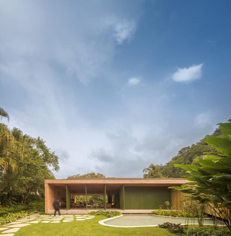 MF+Arquitettos' dry pink concrete residence emerges from Rio de Janeiro's lush jungle