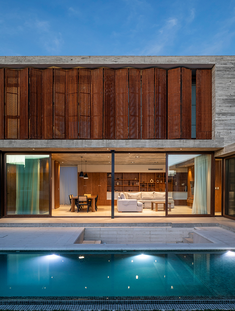 TIM arquitectos combines concrete and corten steel for casa guayubira in buenos aires