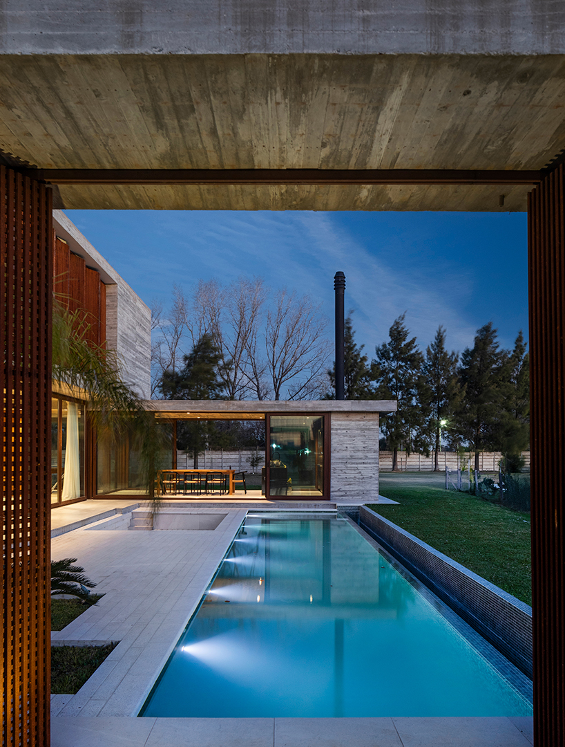 TIM arquitectos combines concrete and corten steel for casa guayubira in buenos aires