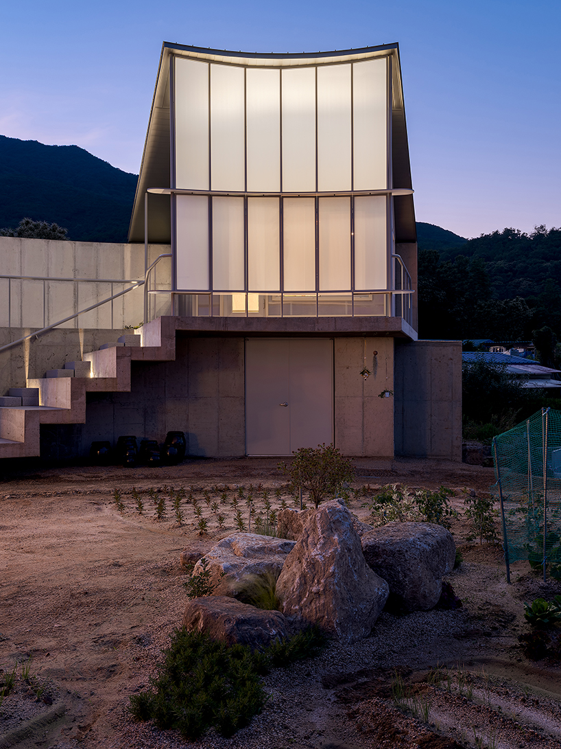 circular house by sukchulmok + BRBB encloses vegetable garden on korean farmland