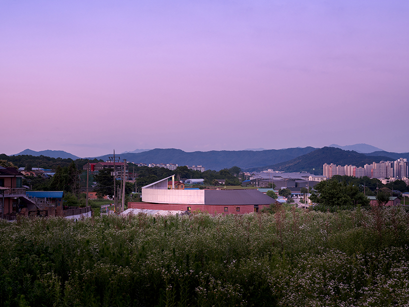 circular house by sukchulmok + BRBB encloses vegetable garden on korean farmland