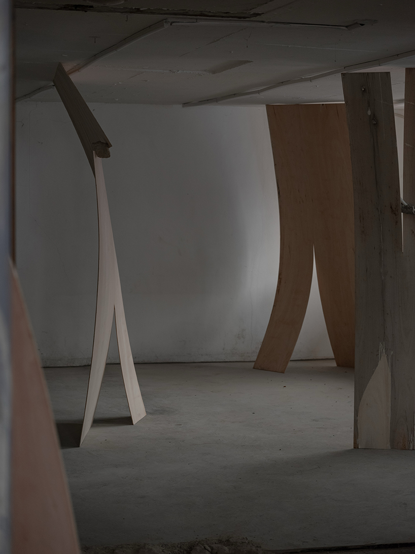 sculptures made of timber and steel occupy raw concrete shell in seoul before demolition - 10