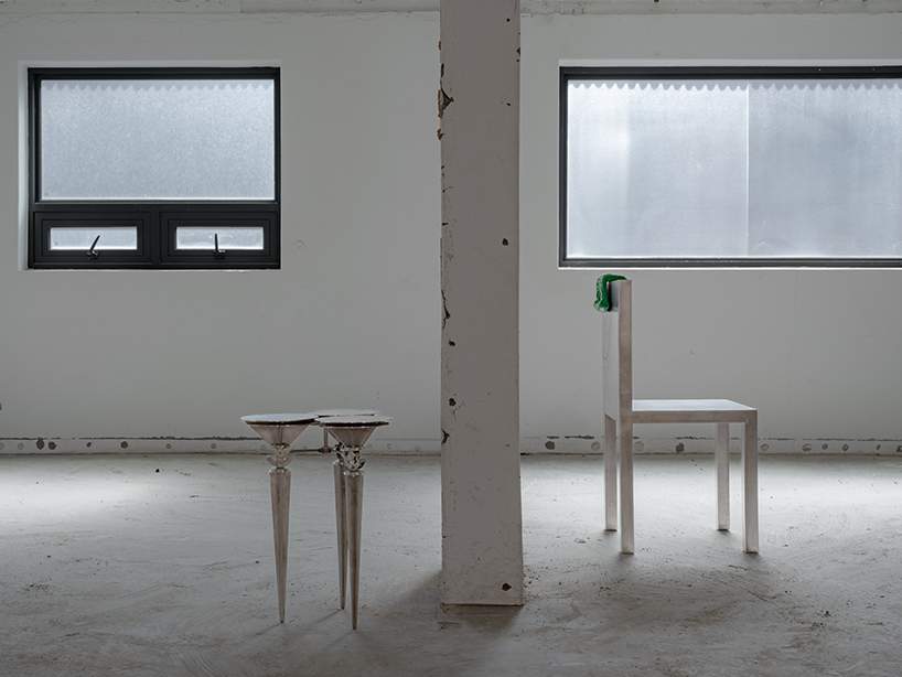 sculptures made of timber and steel occupy raw concrete shell in seoul before demolition - 7