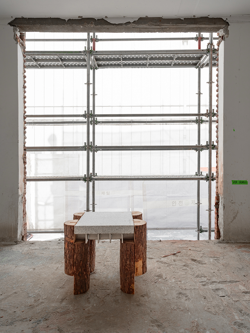 sculptures made of timber and steel occupy raw concrete shell in seoul before demolition - 8