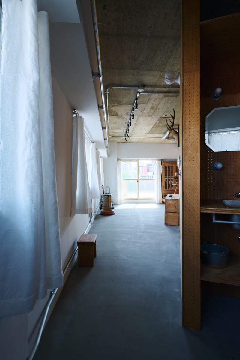 continuous cloister layout rearranges renovated apartment in japan