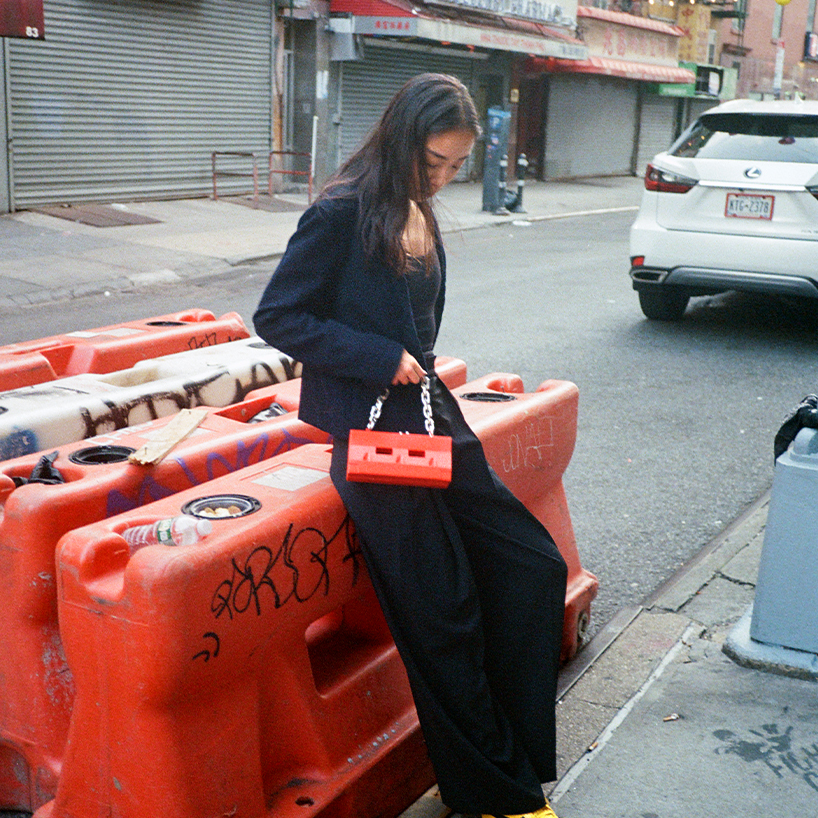 chris luu captures the urban charm of street barricades in a resin purse