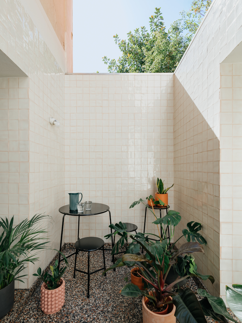 ala.rquitectos integrates light-filled courtyard into renovated lisbon apartment