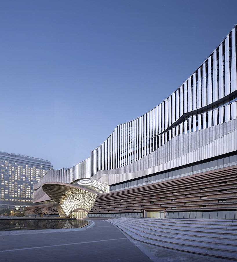 changsha conference center's facade by SCAD employs perforated metal panels