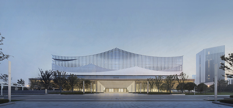 changsha conference center's facade by SCAD employs perforated metal panels