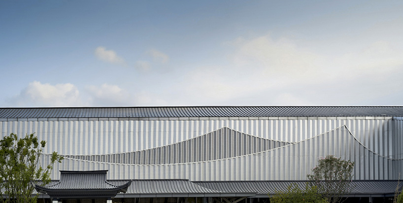 changsha conference center's facade by SCAD employs perforated metal panels