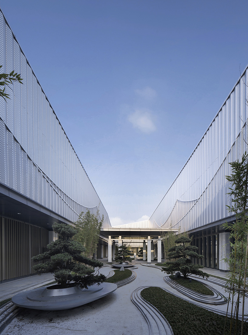 changsha conference center's facade by SCAD employs perforated metal panels