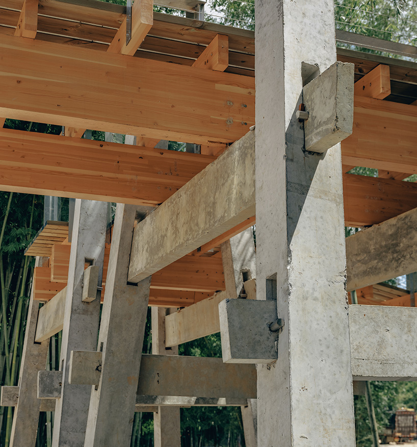 vernacular bridge craftsmanship informs micro-museum set within bamboo grove in china - 10