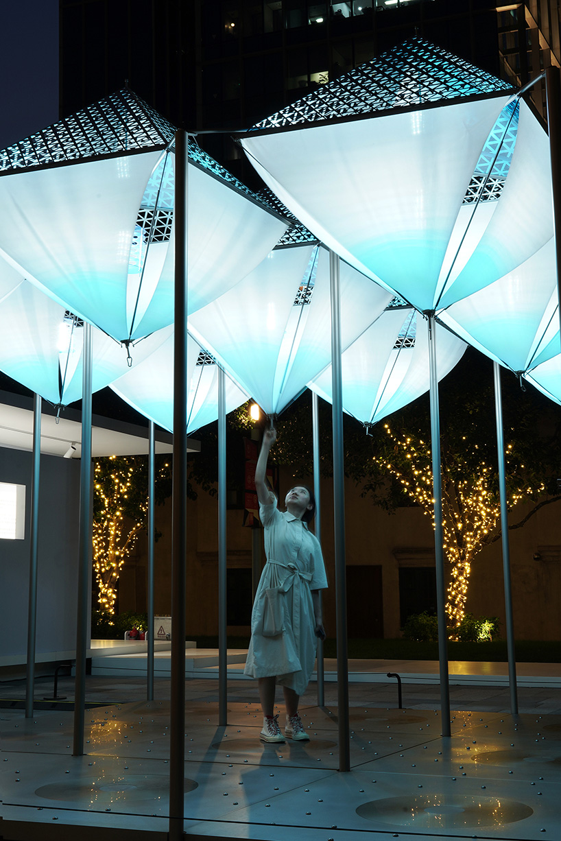 suspended glacier forms translate climate change into an interactive installation in shanghai - 8