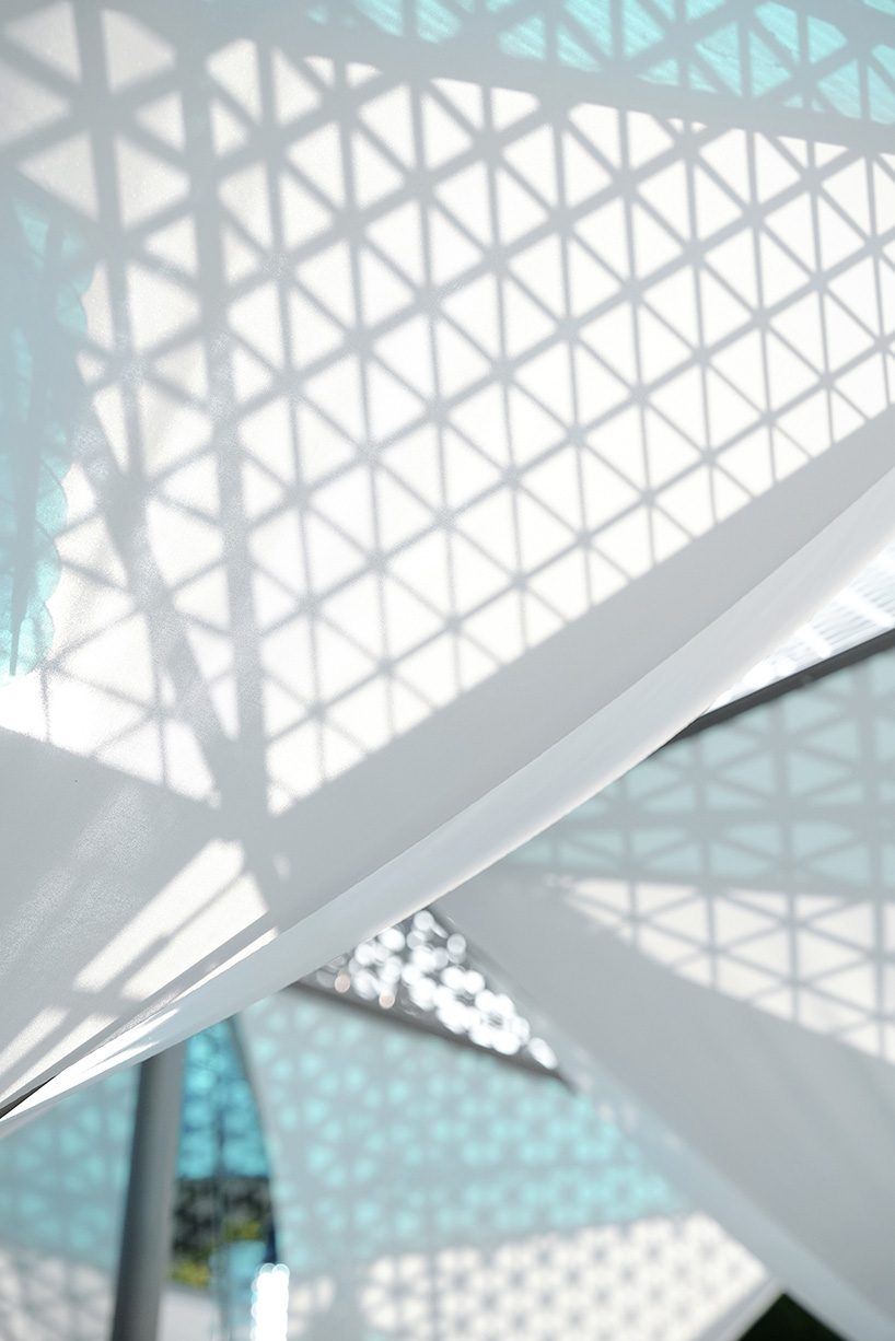 suspended glacier forms translate climate change into an interactive installation in shanghai - 5
