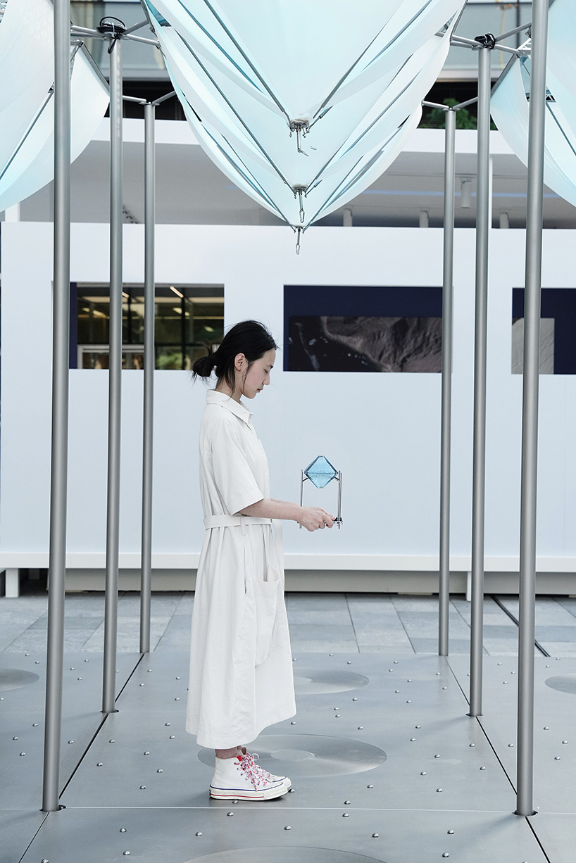 suspended glacier forms translate climate change into an interactive installation in shanghai - 9