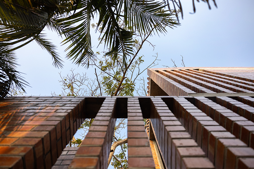 brick walls and perforated jali screens enclose training hub by codec in coastal bangladesh