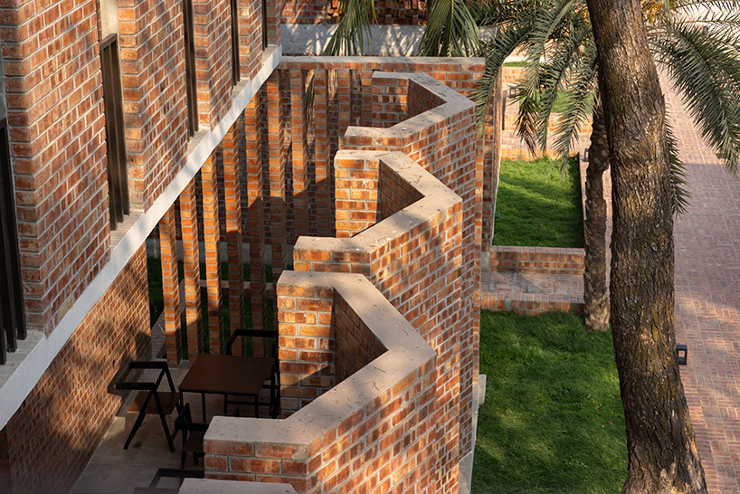 brick walls and perforated jali screens enclose training hub by codec in coastal bangladesh