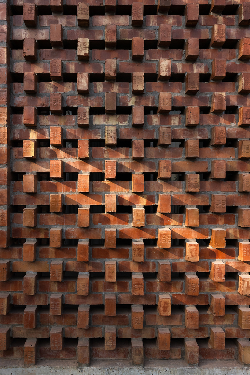 brick walls and perforated jali screens enclose training hub by codec in coastal bangladesh