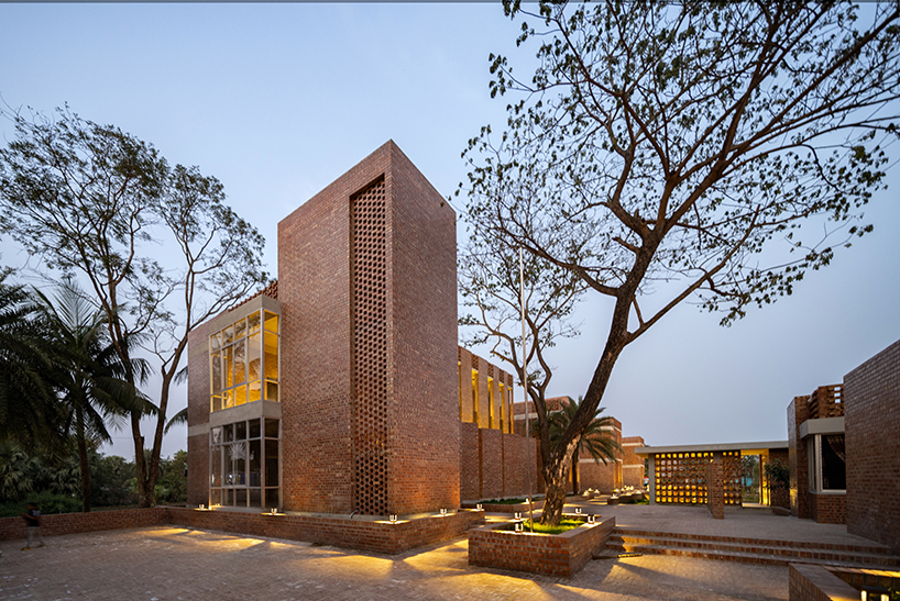 brick walls and perforated jali screens enclose training hub by codec in coastal bangladesh