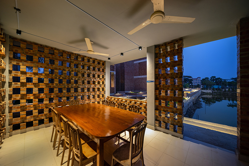 brick walls and perforated jali screens enclose training hub by codec in coastal bangladesh