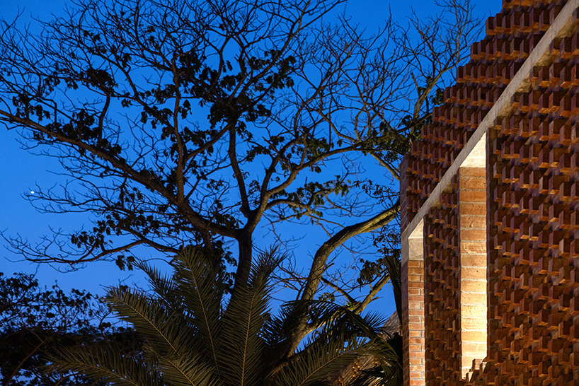 brick walls and perforated jali screens enclose training hub by codec in coastal bangladesh